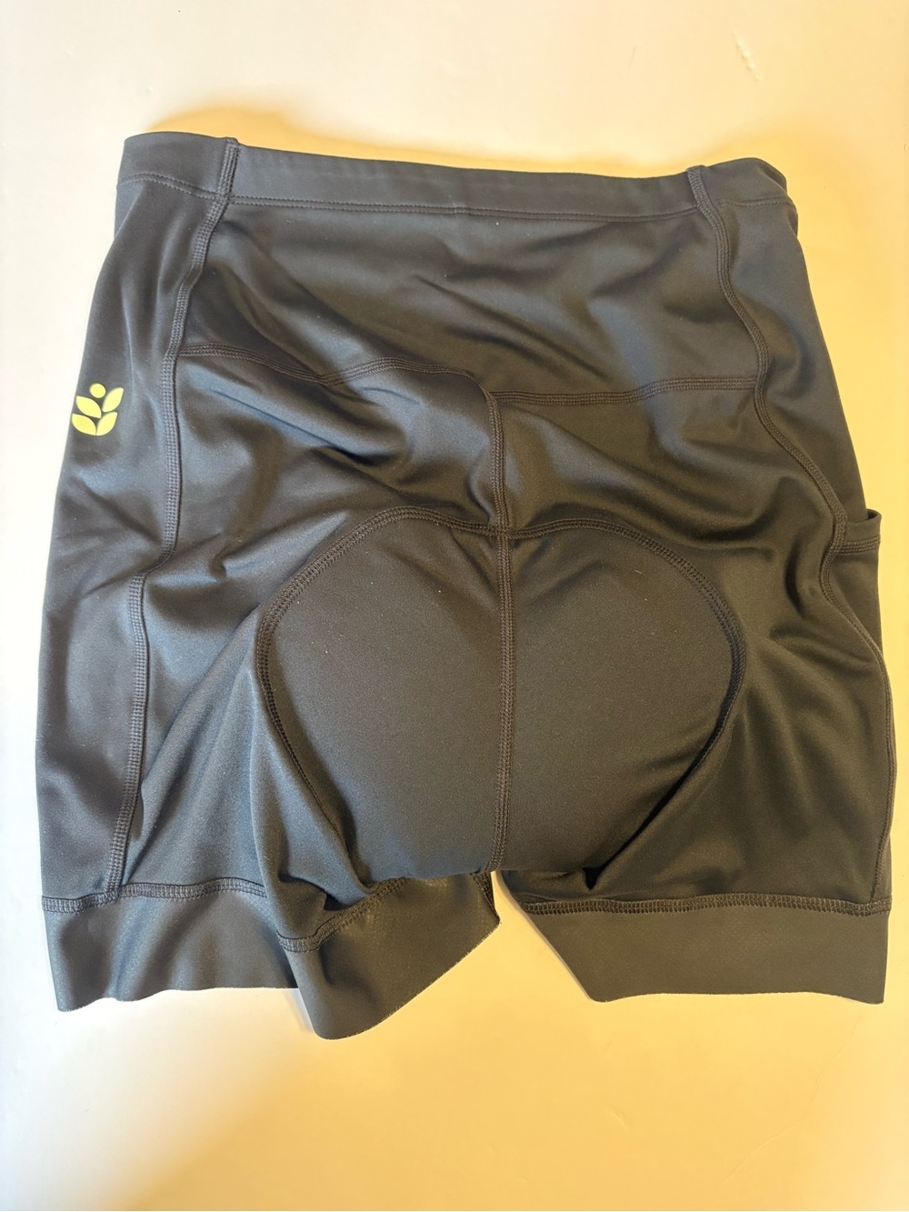 Wild rye, Women's Black Padded Bike Shorts with Subtle Yellow Accent size 4